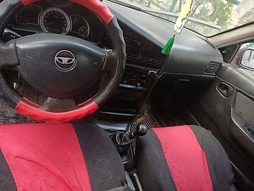 Daewoo Nexia: 2010 г., 1.5 л, Механика, Бензин, Седан