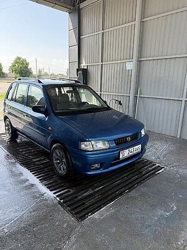 camry 2010: Mazda Demio: 1999 г., 1.3 л, Механика, Бензин, Универсал — 2