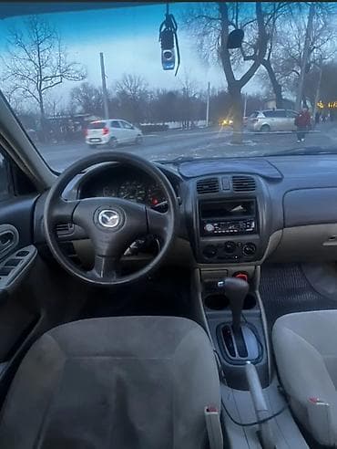 step 2: Mazda Protege: 2003 г., 2 л, Автомат, Бензин, Седан — 4