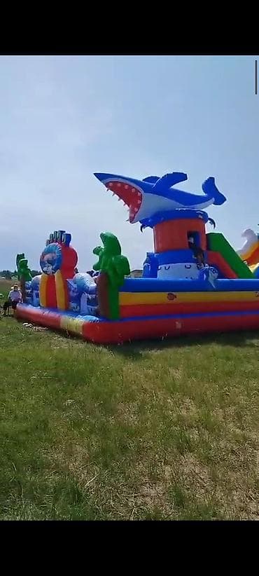 Надувной детский игровой комплекс «Морской мир» с горками и батутной at lalafo.kg Надувной детский игровой комплекс «Морской мир» с горками и батутной