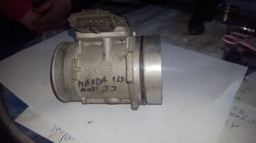 купить английского мастифа: Mazda 121 расходомер воздуха — 1