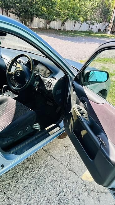 Транспорт: Mazda Familia: 2001 г., 1.5 л, Автомат, Бензин, Универсал — 10