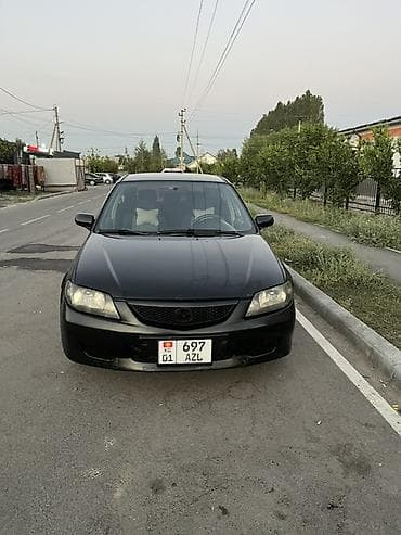 mazda cronos: Mazda Familia: 2003 г., 1.6 л, Механика, Бензин, Универсал — 8