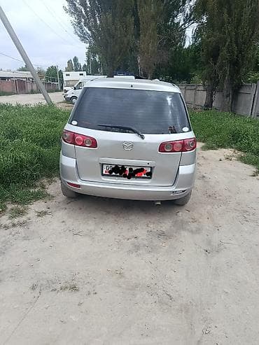 mazda 3: Mazda Verisa: 2004 г., Автомат, Бензин, Хэтчбэк — 5