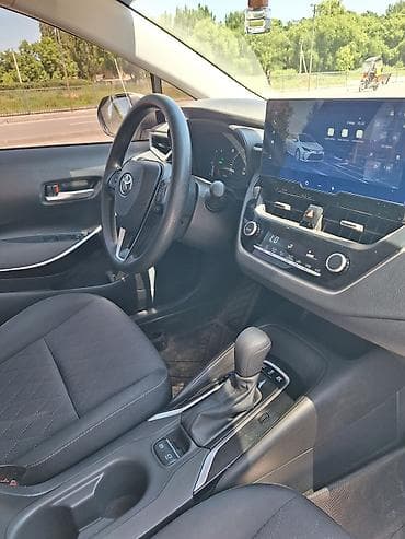 рестайлинг: Toyota Corolla: 2023 г., 1.8 л, Вариатор, Гибрид, Седан — 10