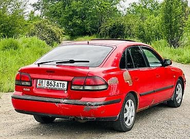 ош жапалак: Mazda 626: 1998 г., 2 л, Кол менен иштөөчү, Бензин, Седан — 4