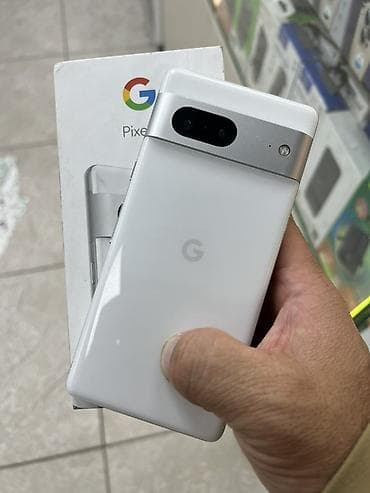 nokia e51: Google Pixel 7a, Б/у, 128 ГБ, цвет - Белый, 1 SIM, 2 SIM, eSIM — 1