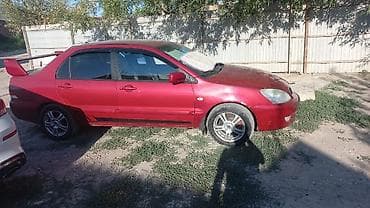 Транспорт: Mitsubishi Lancer: 2003 г., Седан — 2