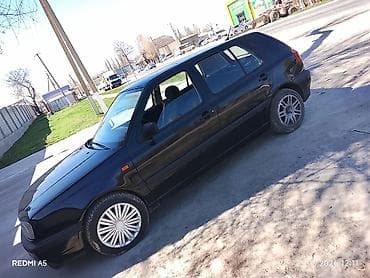 салон машины: Volkswagen Golf: 1993 г., Хэтчбэк — 3