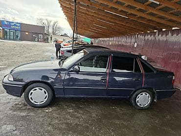 Легковой автомобиль седан. Основные характеристики: - Кузов