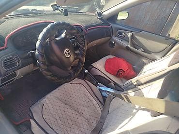 235 60 р18: Mazda 323: 2003 г., 1.6 л, Механика, Бензин, Универсал — 5