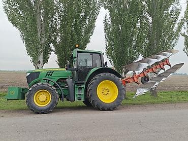 стойки на плуг: Трактор John Deere 6155M с навесным оборотным плугом Основные — 2