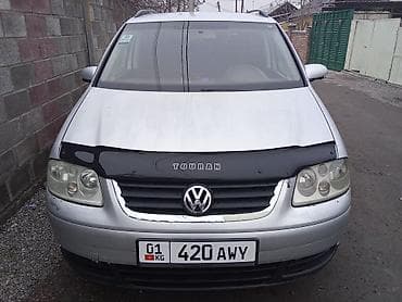 Продажа авто: Volkswagen Touran: 2006 г., 1.9 л, Автомат, Дизель, Минивэн — 4