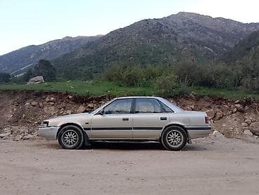 бампер 124 ош: Mazda 626: 1990 г., 2.2 л, Механика, Бензин, Седан — 8
