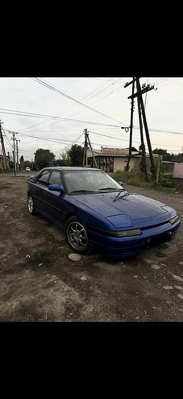 colf 2: Mazda Familia: 1992 г., Бензин, Хэтчбэк — 6