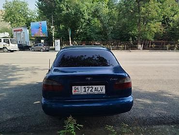 Транспорт: Daewoo Lanos: 1999 г., Бензин, Седан — 4