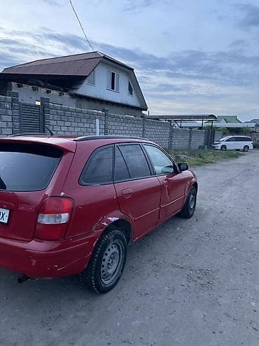 хонда истеп 1: Mazda Familia: 1999 г., 1.5 л, Кол менен иштөөчү, Бензин, Универсал — 4