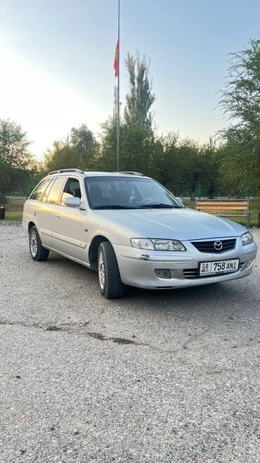 матизге шина: Mazda Capella: 2001 г., Механика, Универсал — 1