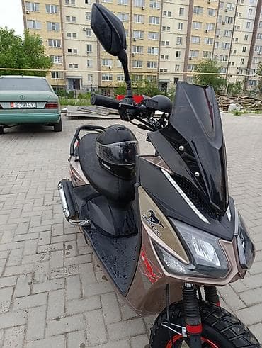 kia ev9: Скутер самурай (брендовые наклейки самурай на бортах) — 6