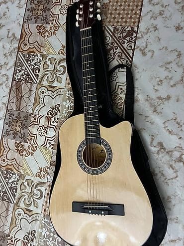 Классическая гитара с вырезом (cutaway) формата дредноут. - 6 струн