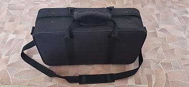 Чехол для кларнета, лёгкий, чёрного цвета, устойчив к дождю. Имеется