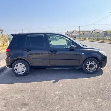 последующим: Mazda Demio: 2004 г., 1.5 л, Автомат, Бензин, Хэтчбэк — 9
