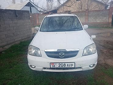 е39 e39: Mazda Tribute: 2002 г., 2 л, Автомат, Газ, Кроссовер — 6