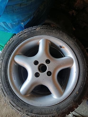 донголок 195 70 15 с: Колеса в сборе 185 / 60 / R 15, Зимняя шипованная, Комплект, Легковые, Литые, отверстий - 4 — 1