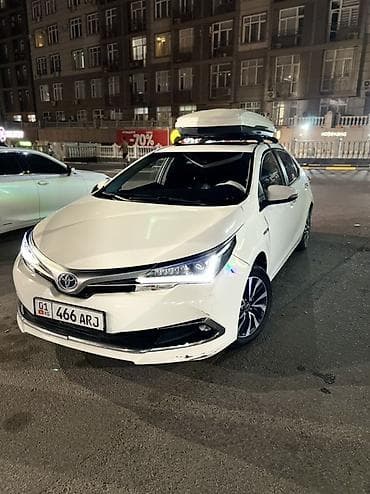 Toyota Corolla: 2019 г., 1.8 л, Робот, Гибрид, Седан