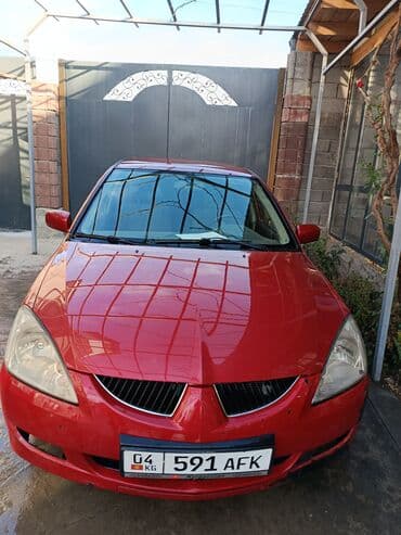 Mitsubishi Lancer: 2006 г., 1.6 л, Механика, Бензин