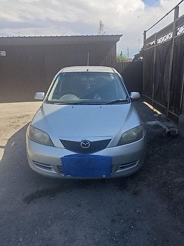 мега авто: Mazda Demio: 2004 г., 1.3 л, Автомат, Бензин, Хэтчбэк — 1