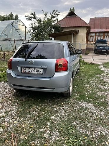 Унаа: Toyota Corolla: 2004 г., 1.6 л, Кол менен иштөөчү, Бензин, Хетчбек — 3