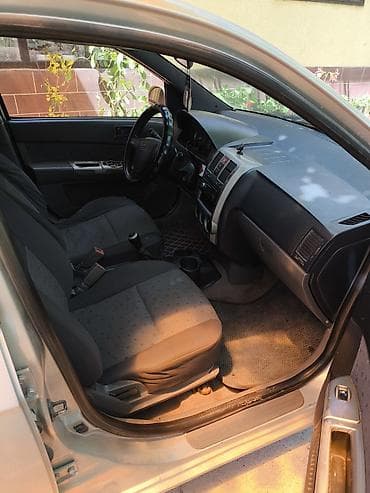 хундай аванте 1: Hyundai Getz: 2002 г., 1.4 л, Кол менен иштөөчү, Бензин, Хетчбек — 6