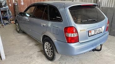 super cub: Mazda 323: 2002 г., 1.6 л, Механика, Бензин, Универсал — 3