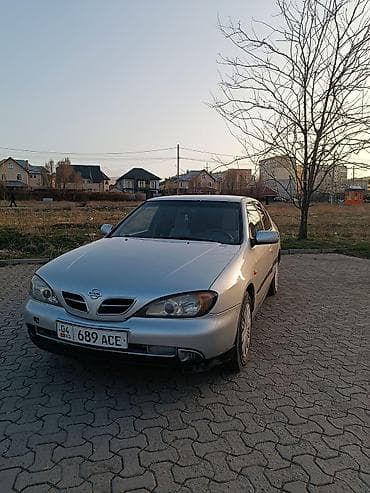 bmw e34 1995: Седан серебристого цвета, 4 двери, передний привод. Кузов с плавными — 4