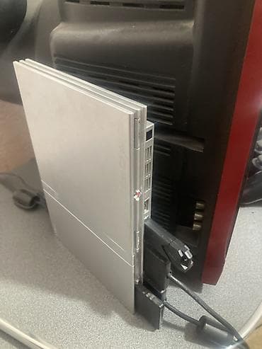 Игровая приставка Sony PlayStation 2 Slim (серебристая). Прошитая — 1