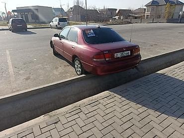 mitsubishi eclipse: Mazda 626: 1992 г., 2 л, Механика, Бензин, Седан — 3