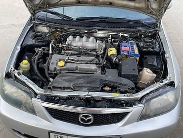 кузов мазда: Mazda 323: 2003 г., 1.6 л, Ручные, Бензин, Седан — 5