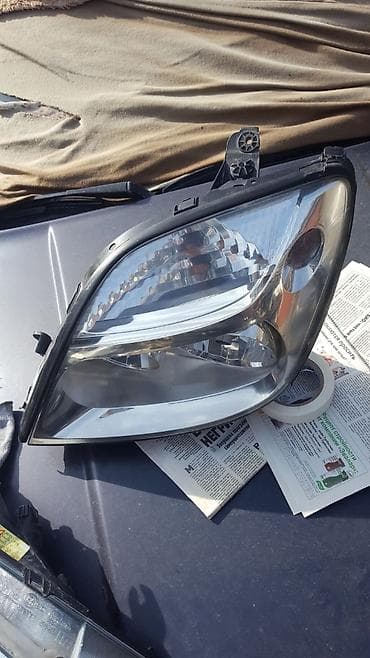 renault: Левая фара Renault Scenic — 1