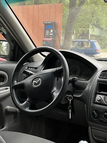 продам мазда 323: Mazda 323: 2002 г., 1.3 л, Механика, Бензин, Хэтчбэк — 7