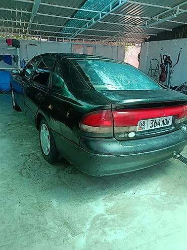 атего 1229: Mazda 626: 1993 г., Механика, Седан — 3