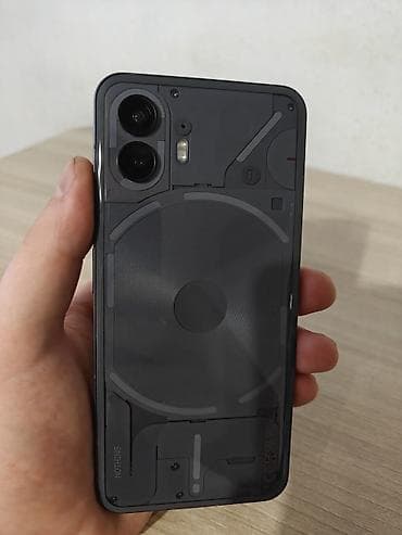 минивен фото: Nothing, Phone 2, Б/у, 256 ГБ, цвет - Серый, 1 SIM, 2 SIM — 1