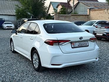 eclipse cross: Toyota Corolla: 2022 г., 1.8 л, Вариатор, Гибрид, Седан — 5