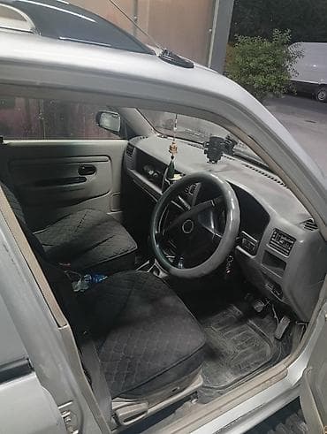 Mazda Demio: 1997 г., 1.5 л, Механика, Газ, Универсал — 4