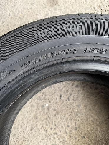 saka diska: Пара летних шин Dunlop EC202 - Размер: 185/65 R14 - Индекс — 2