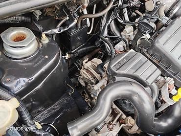 bmw 39: Daihatsu Cuore: 2003 г., Механика, Хэтчбэк — 7