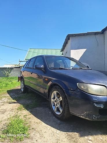 fit shuttle: Mazda 323: 2002 г., 1.6 л, Ручные, Бензин, Хэтчбэк — 1