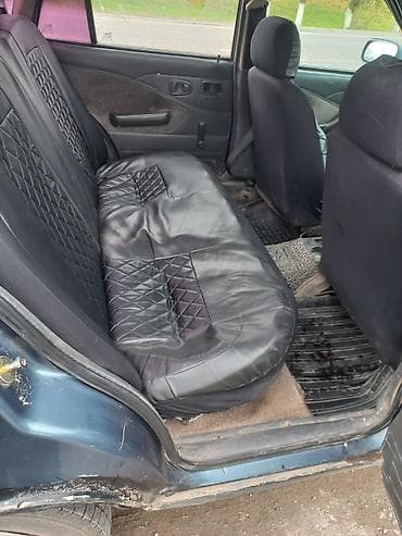 спада крыло: Daewoo Nexia: 2004 г. — 4