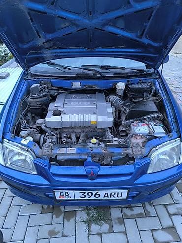омыватель лобового: Mitsubishi Space Star: 1999 г., 1.8 л, Механика, Бензин, Универсал — 9