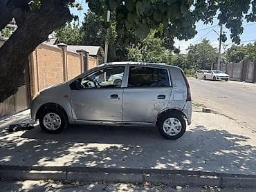 Унаа: Daihatsu Sirion: 2004 г., 1 л, Кол менен иштөөчү, Бензин, Хетчбек — 6